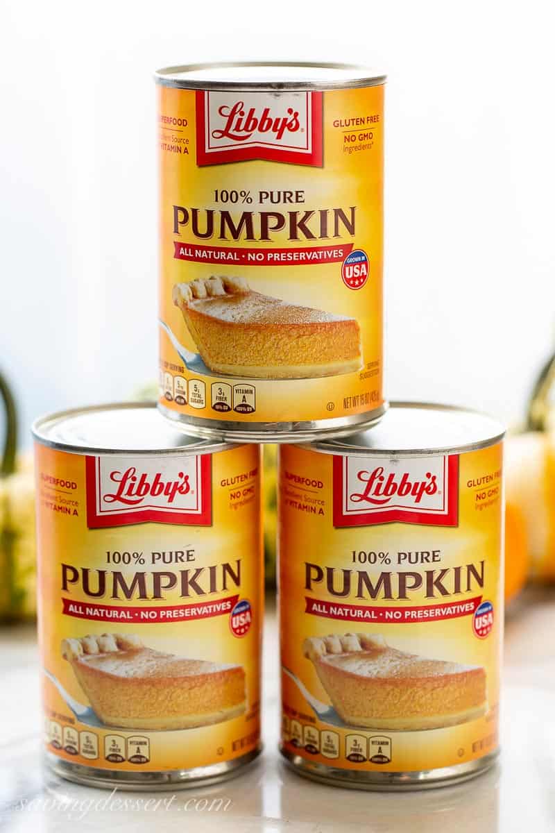 A stack of cans of Libby's 100% Pure Pumpkin