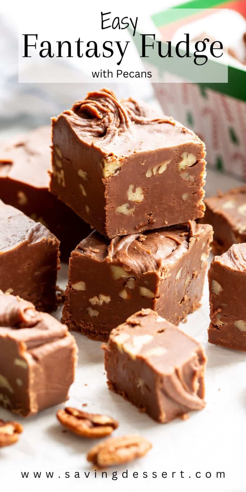a stack of chocolate fudge with pecans