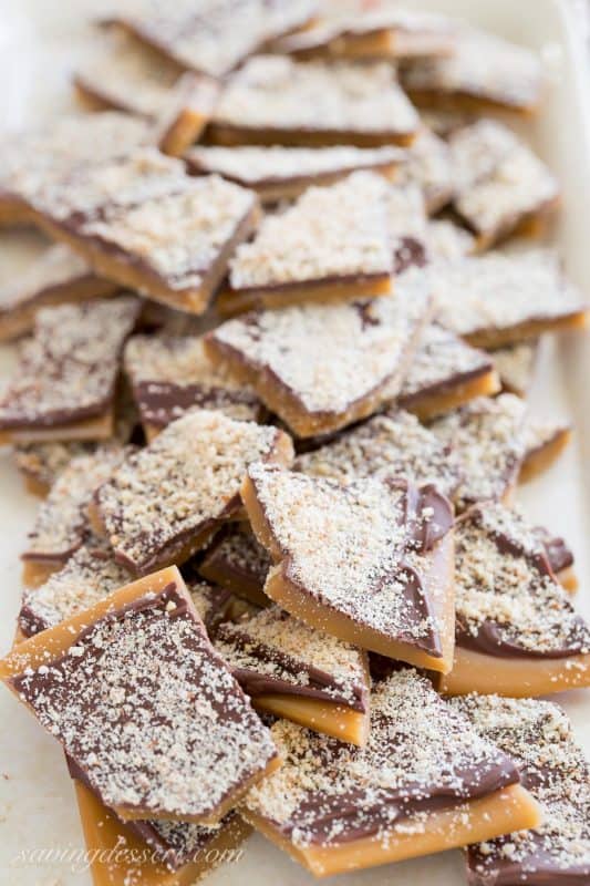 Easy to make and perfect for gifting, Old Fashioned English Toffee dusted with grated almonds - a family favorite for generations! www.savingdessert.com #savingroomfordessert #toffee #christmas #candy #englishtoffee