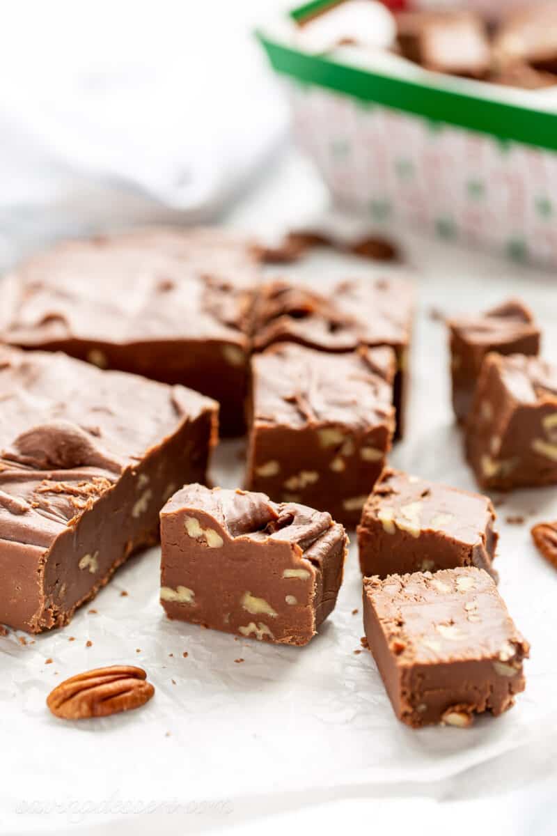 Chocolate fudge being sliced into bite size pieces