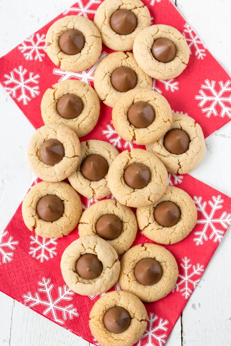 overhead view of a chocolate kiss cookies on holiday napkins