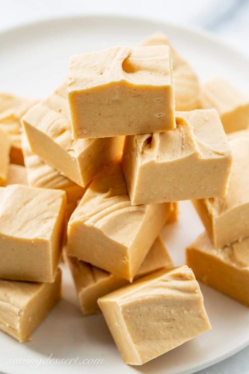 A plate of peanut butter fudge cut into bite sized pieces