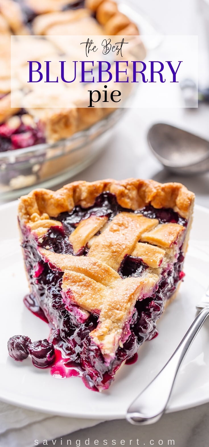 A slice of a lattice topped pie with blueberry filling