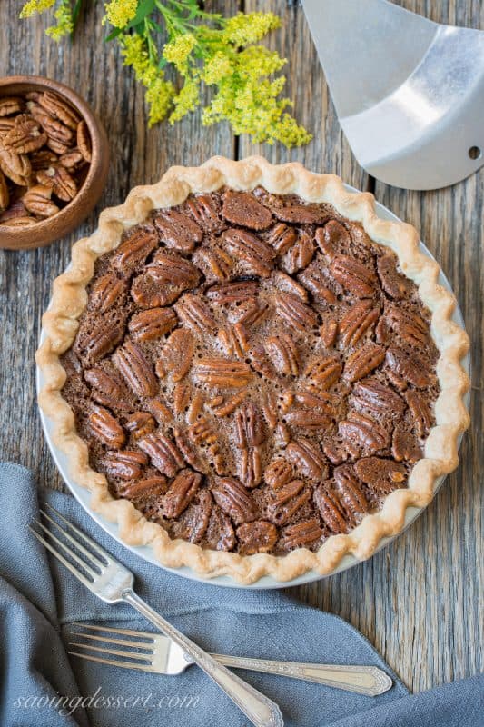 Chocolate Pecan Pie - Fudgy and rich, this is an easy pie to make and everyones favorite during the holidays. www.savingdessert.com