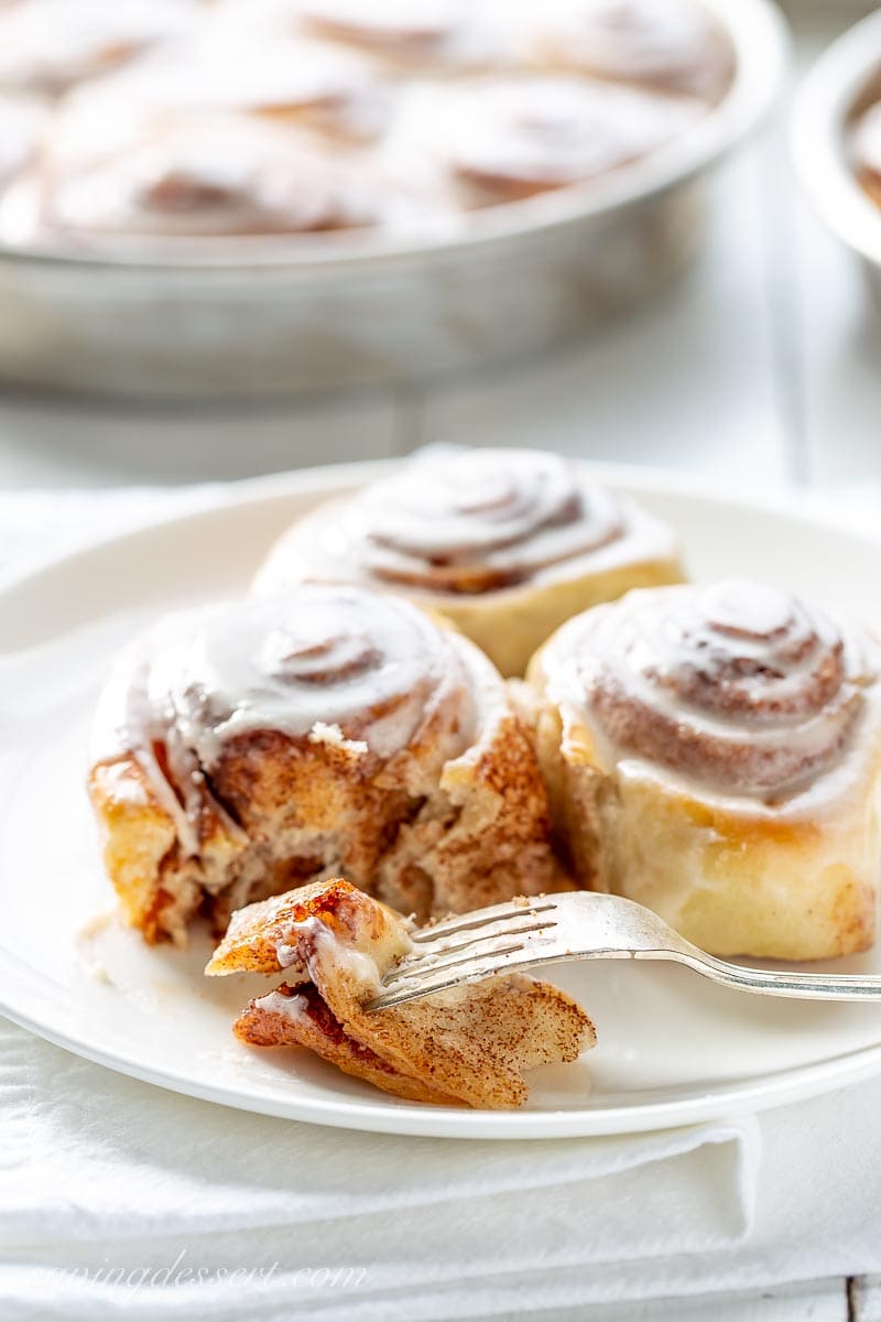 Fresh, warm cinnamon rolls on a plate