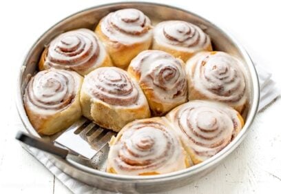 A pan of frosted cinnamon rolls