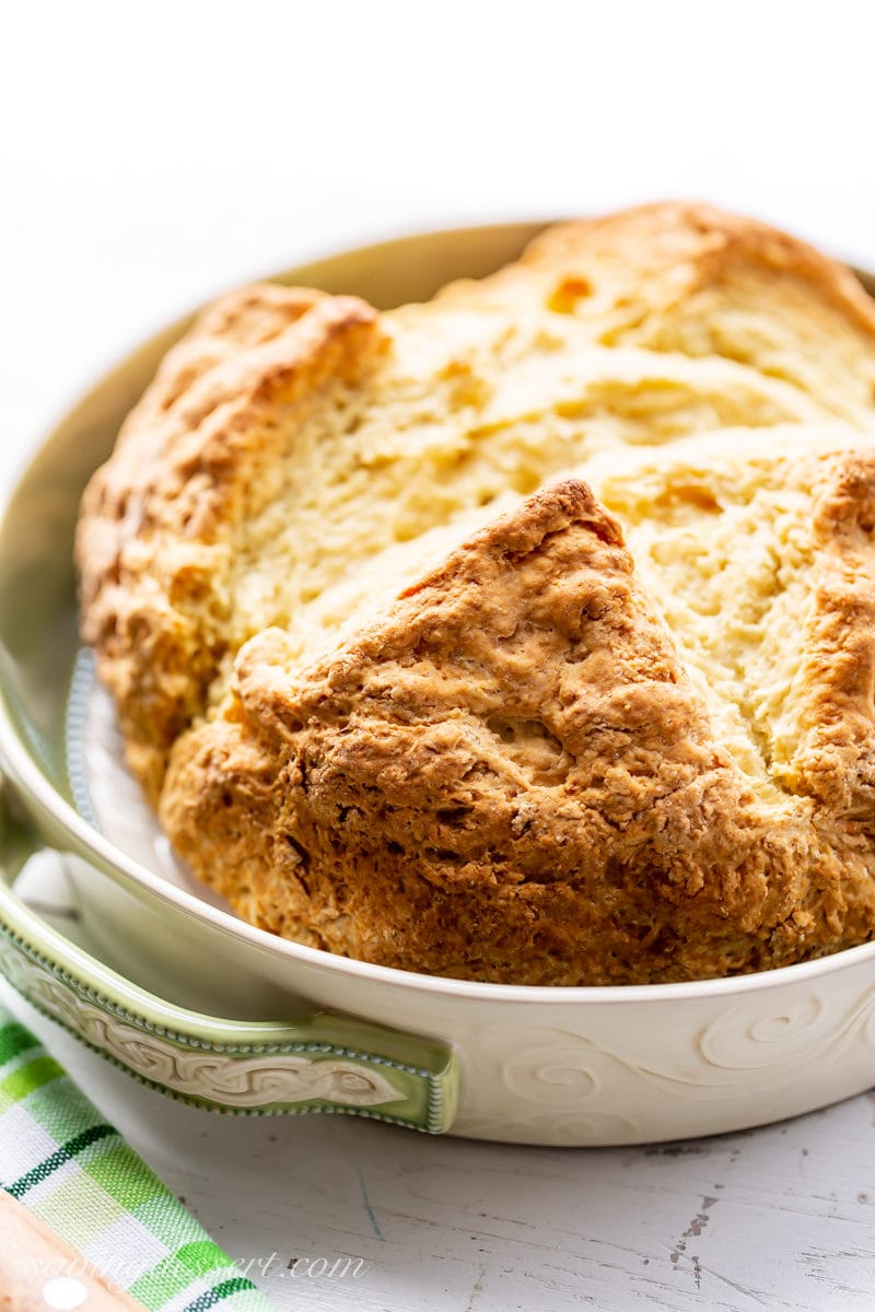 A loaf of Irish soda bread in a pan