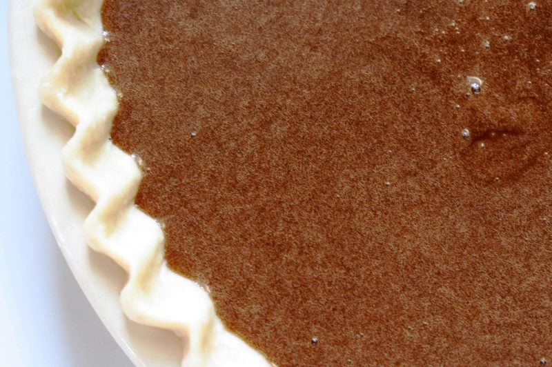 Fudge Pie with a wonderful texture, light chocolate flavor and a filling similar to pecan pie without the pecans! www.savingdessert.com