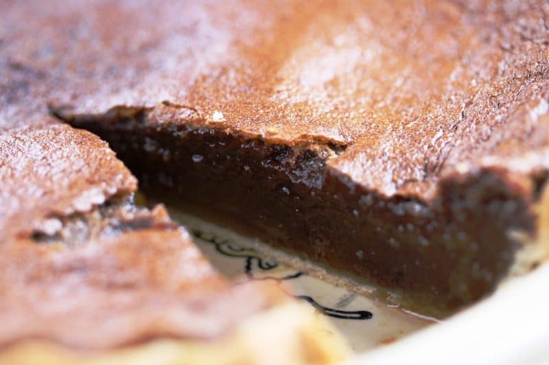 Fudge Pie with a wonderful texture, light chocolate flavor and a filling similar to pecan pie without the pecans! www.savingdessert.com