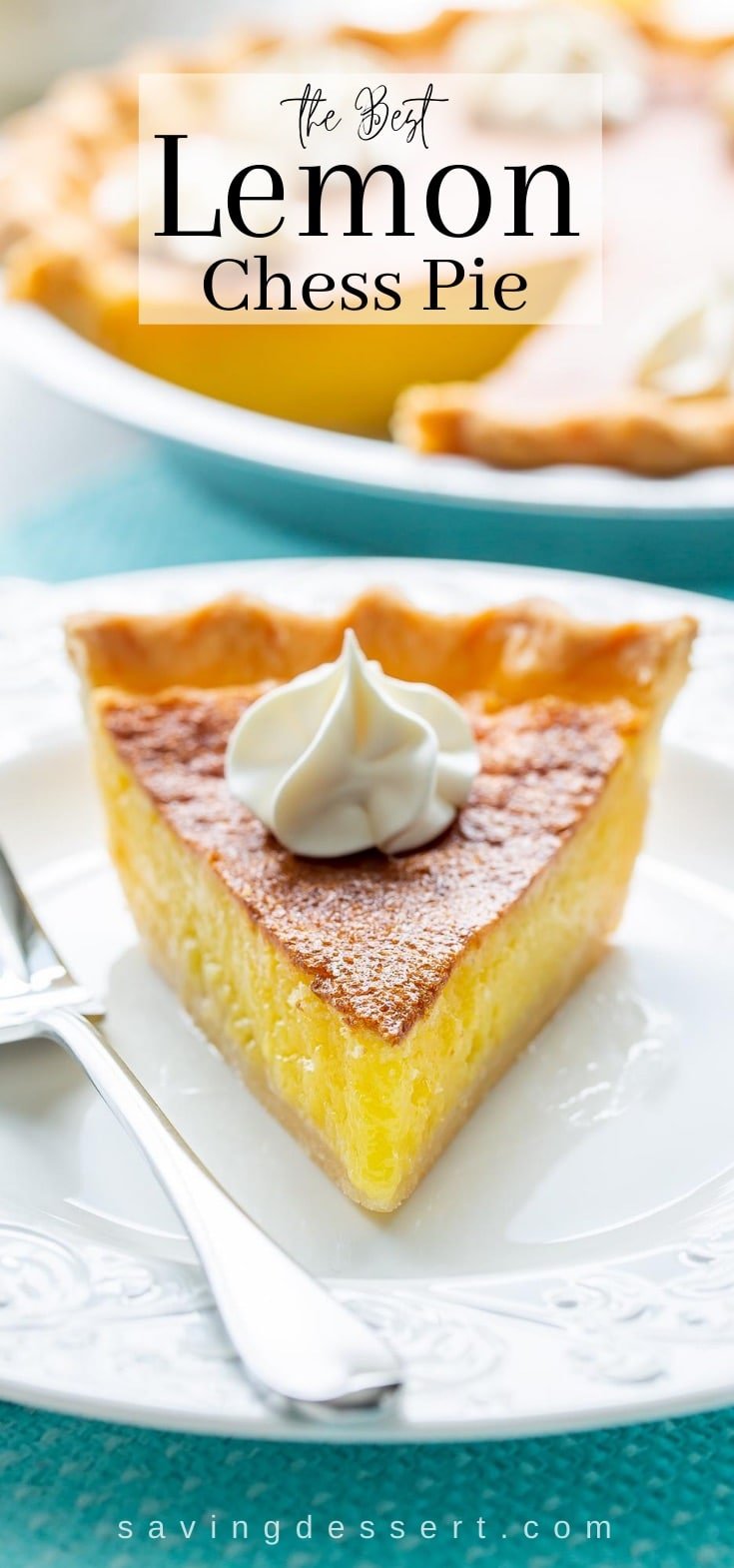 A slice of lemon chess pie on a plate topped with a swirl of whipped cream