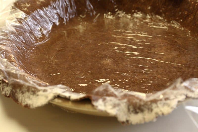 Mississippi Mud Pie - a deliciously light pie with a nice chocolate flavor, crunchy top and soft cake-light middle wrapped up in an easy chocolate crust www.savingdessert.com