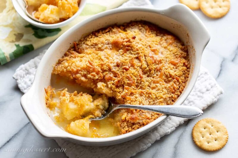 A small casserole dish filled with pineapple casserole