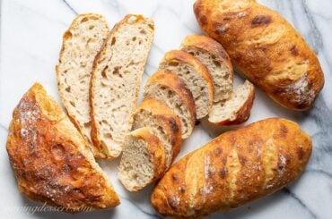 Overhead view of several loaves of homemade no-knead Artisan bread