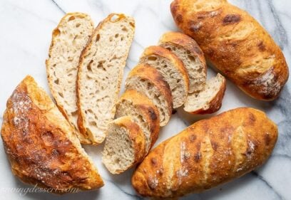 Overhead view of several loaves of homemade no-knead Artisan bread