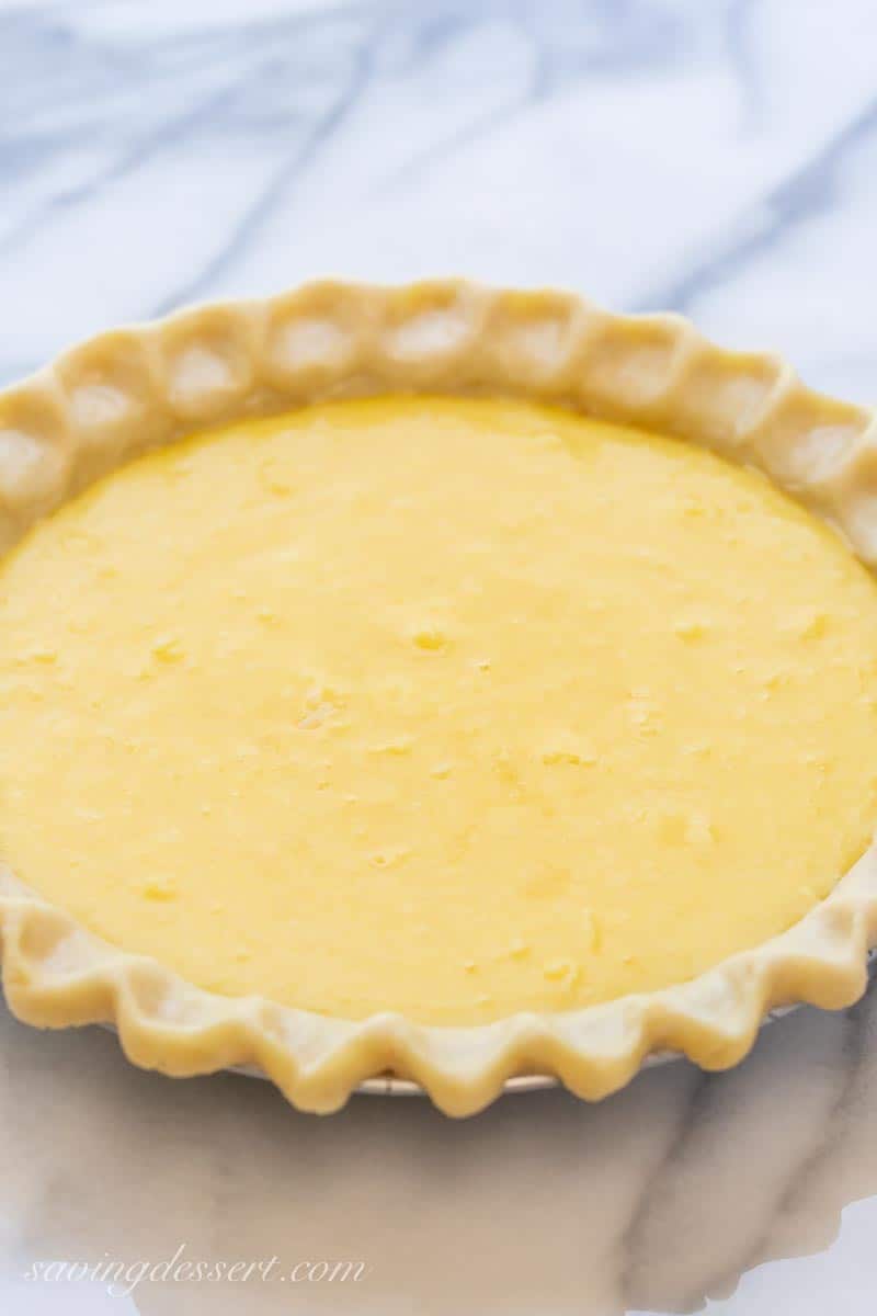 An unbaked pie ready to go in the oven