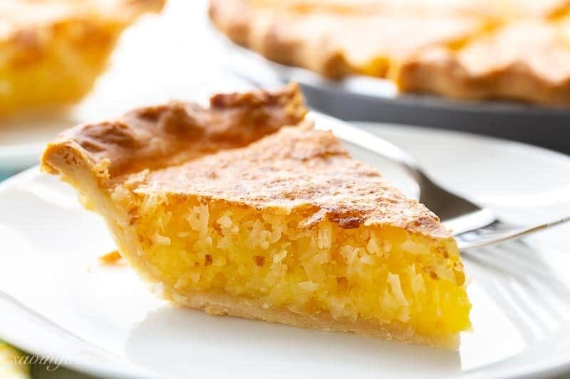 A closeup of a slice of French Coconut Pie on a plate