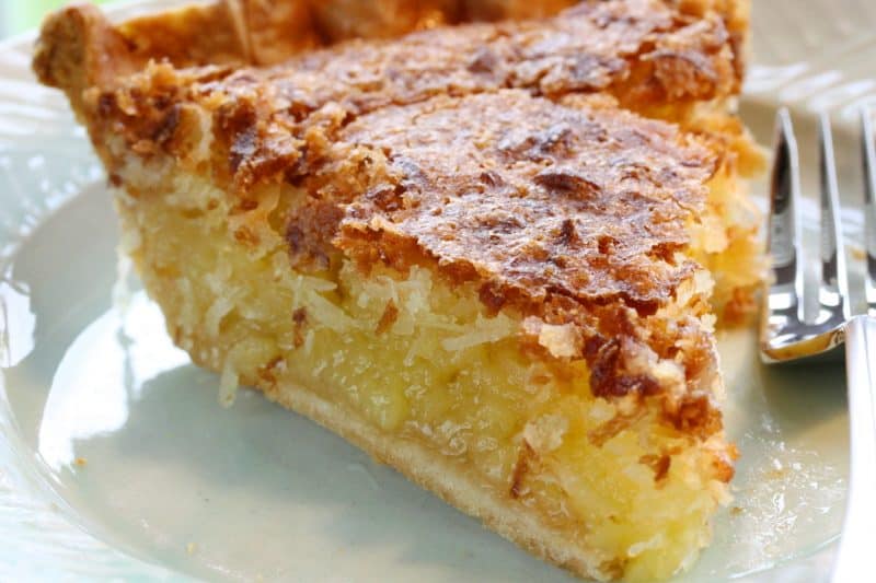 A slice of French Coconut Pie on a plate