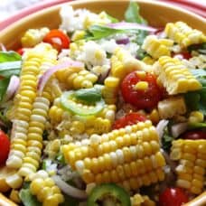 Overhead view of a bowl of Fresh corn-rice salad.
