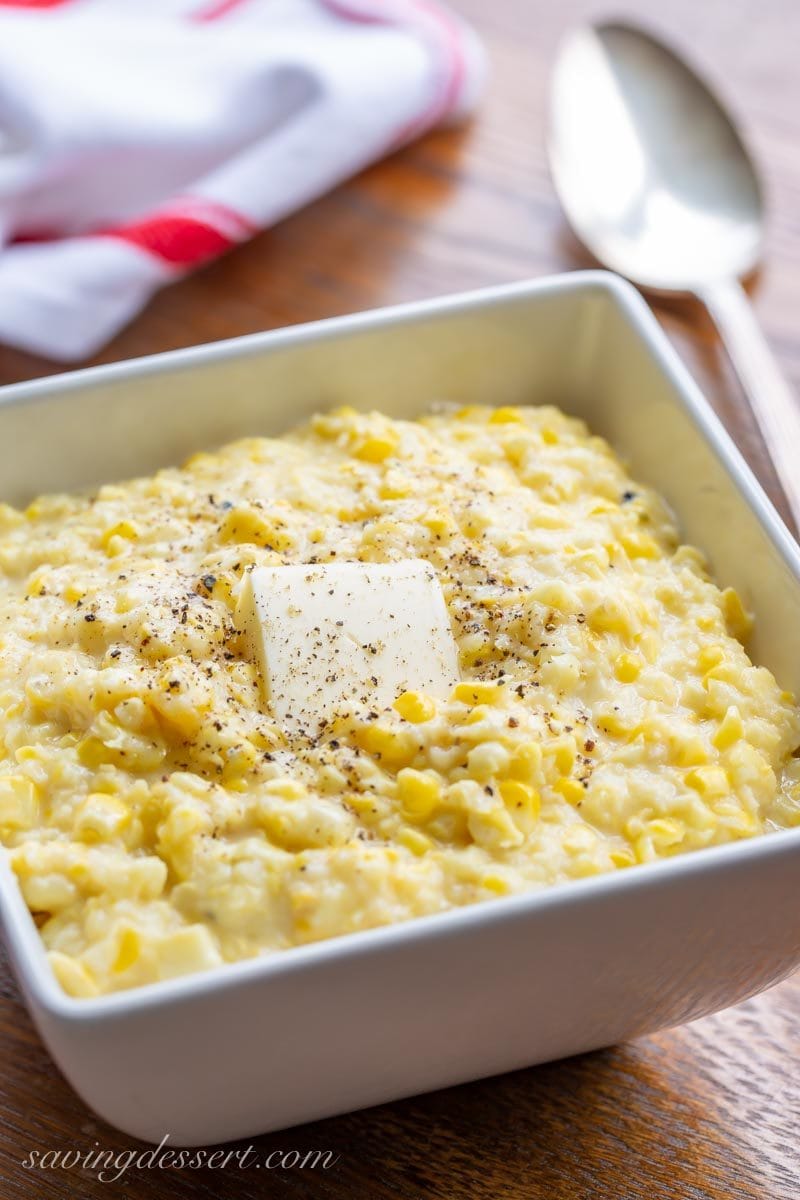 Bowl of fried, skillet corn with butter and black pepper