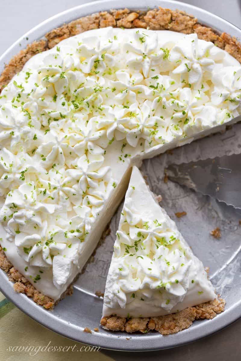 Frozen Margarita Pie with a Pretzel Crust ~ a wonderful light, creamy grown-up dessert that is incredibly easy to make with just a few tasty ingredients. Not too sweet, and not too boozy, this is a must make for all your summer parties! www.savingdessert.com
