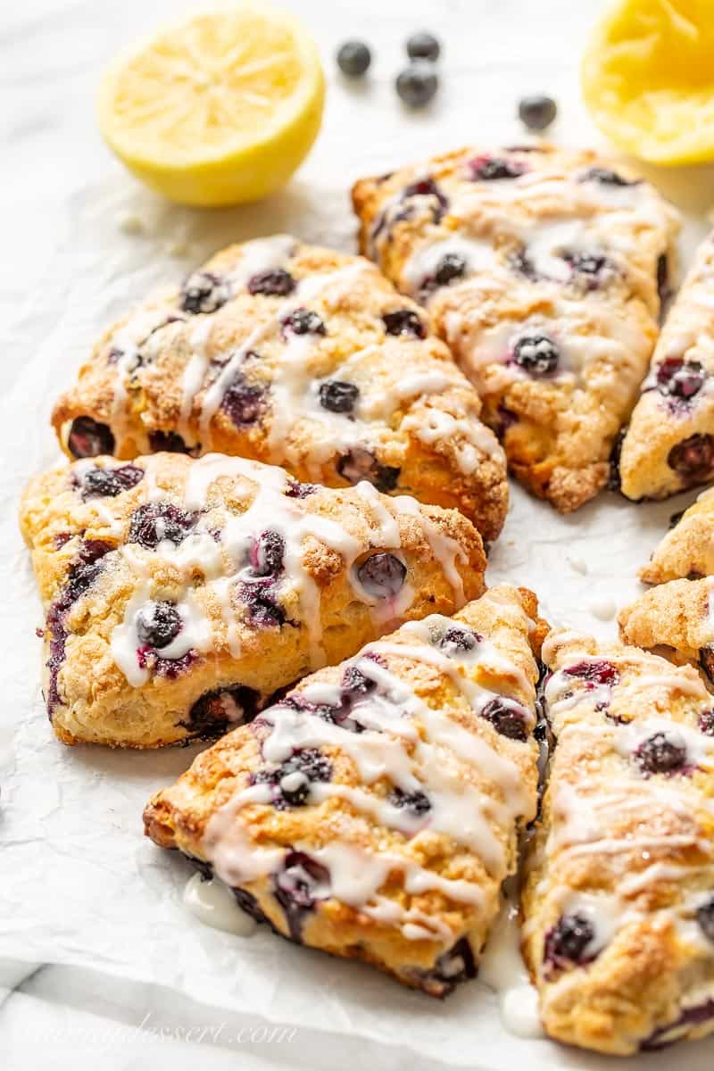 Iced Lemon Blueberry Scones cut into wedges and baked until golden brown