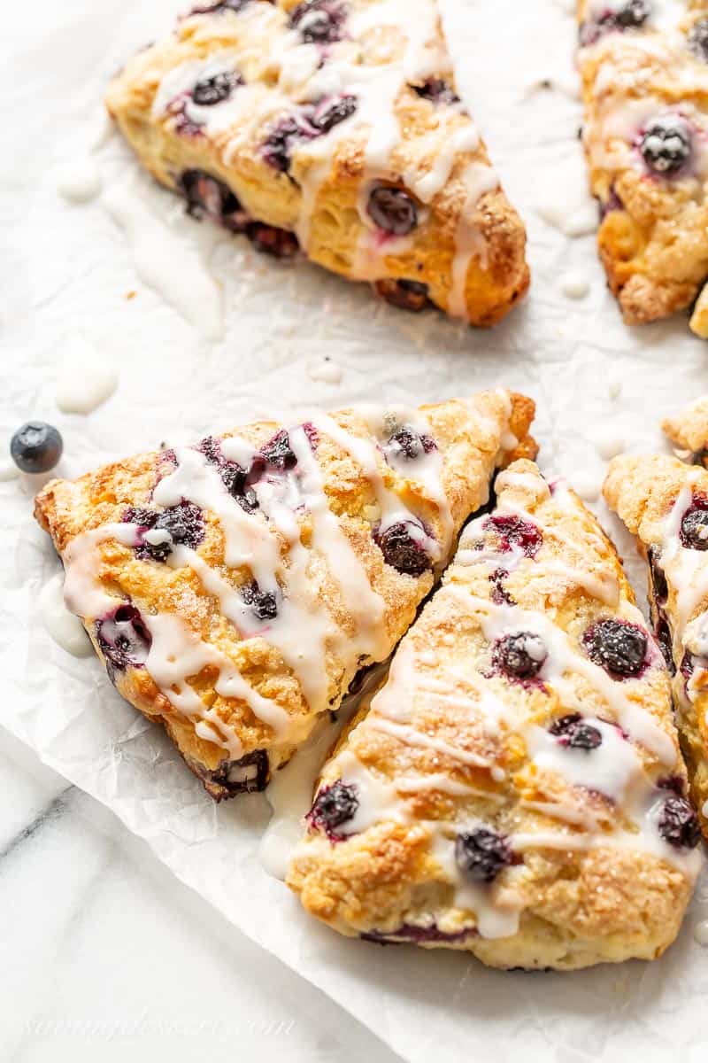 Lemon Blueberry Scone wedges drizzled with lemon icing