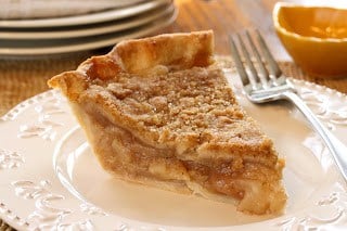 Pear Crumb Pie - juicy pears topped with a sweet crumb mixture wrapped in a flaky crust - fall fruit at it's best! www.savingdessert.com