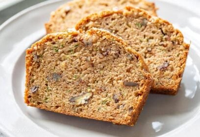 Three slices of zucchini bread on a plate