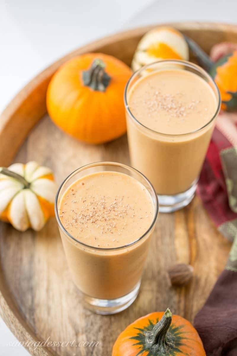 Pumpkin Pie Smoothie - Thick, rich, healthy and creamy, and it tastes like pumpkin pie in a glass. The perfect pumpkin pie craving buster! www.savingdessert.com