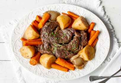 A slow cooker pot roast with potatoes and carrots