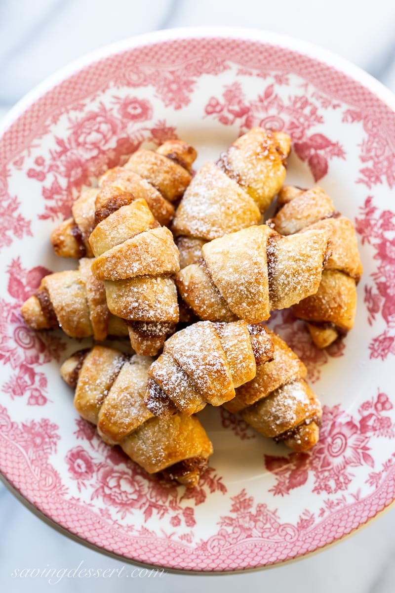A plate stacked with Rugelach cookies