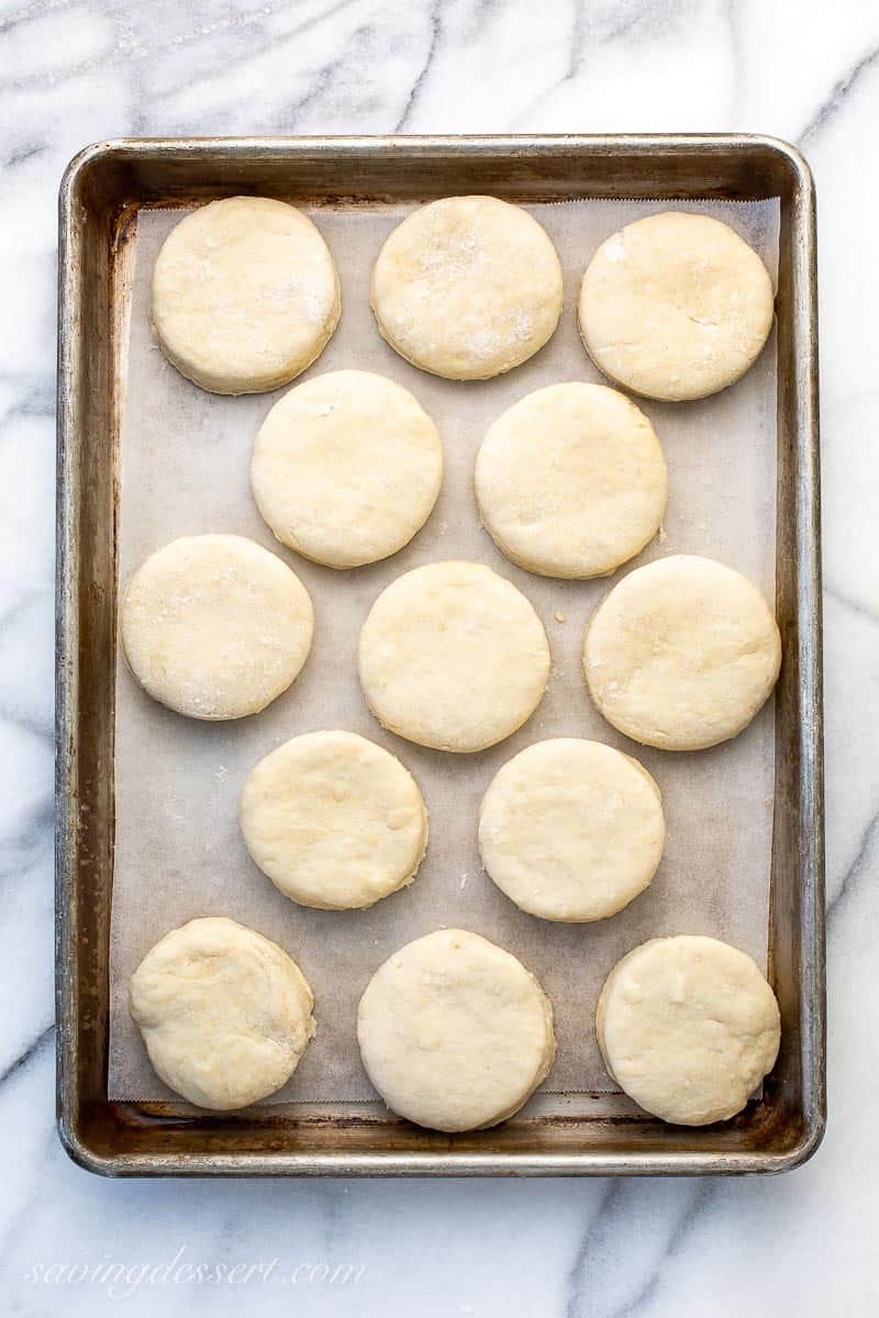 Cut out biscuits on a baking tray ready to bake