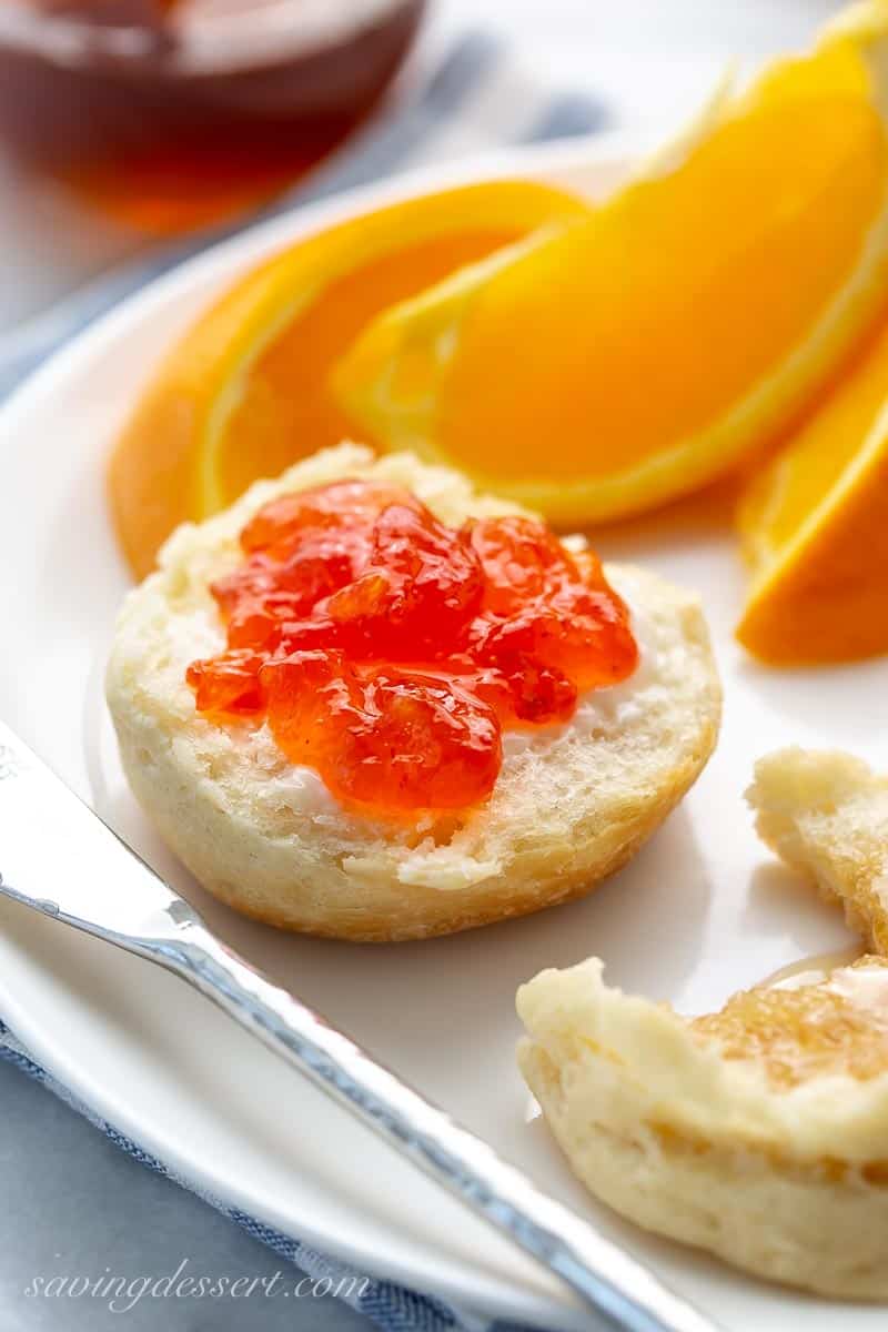 A jelly topped biscuit on a plate