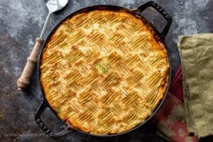 Cottage pie topped with mashed potatoes lightly browned