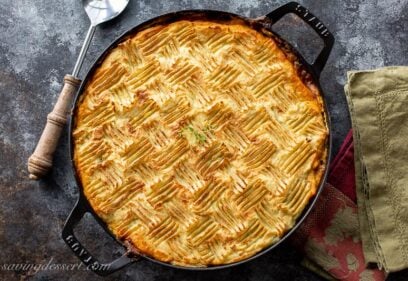 Cottage pie topped with mashed potatoes lightly browned