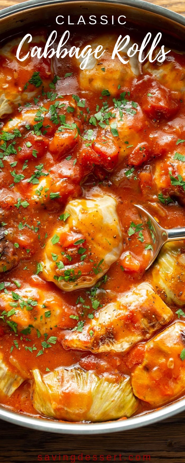 Classic Cabbage Rolls Recipe - with tender cabbage leaves stuffed with rice, seasoned ground beef and caramelized onions simmered in a rich tomato sauce that's a little sweet and a just a tad sour, for a lovely complex flavor and mild bite. #savingroomfordessert #cabbagerolls #classiccabbagerolls #cabbagerollsrecipe #groundbeef #cabbage #tomatosauce #dinner #comfortfood