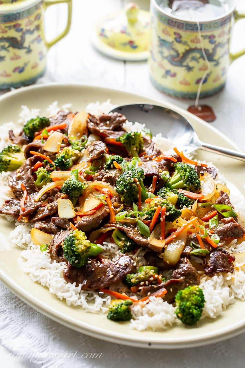 A platter of beef and broccoli over rice