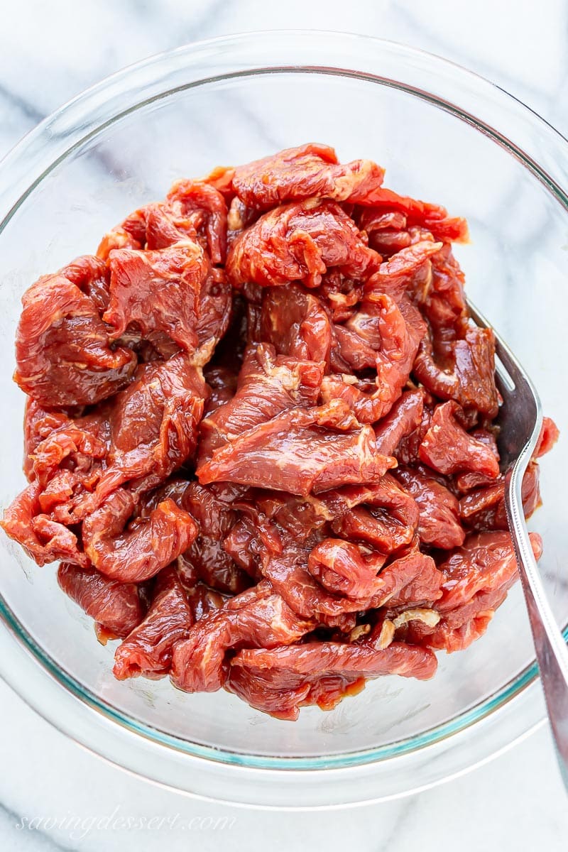 A bowl of sliced sirloin marinated in soy sauce