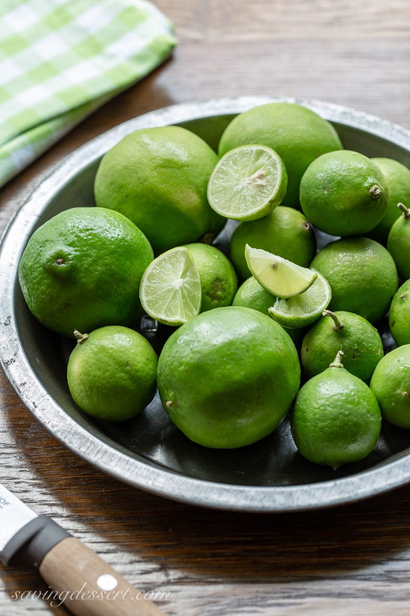 A pan filled with Persian and Key Limes