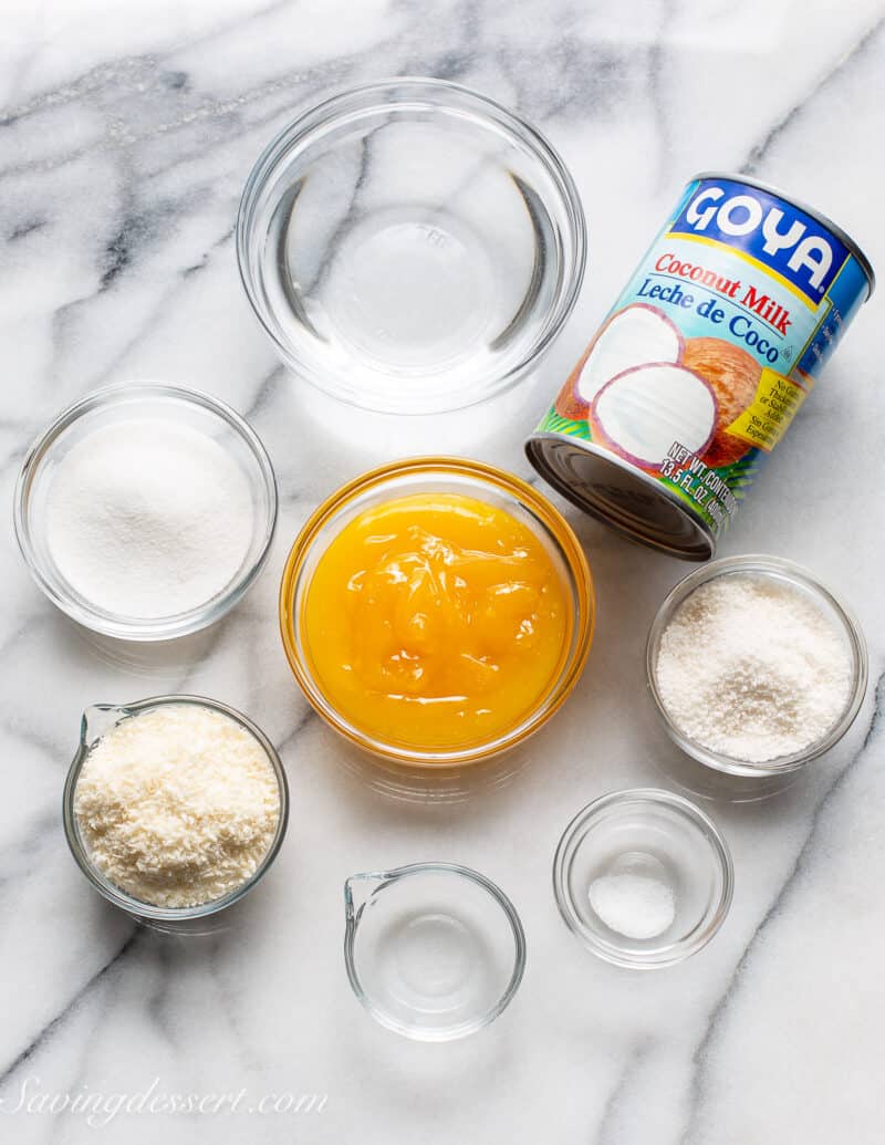 An overhead view of ingredients needed to make tapioca pudding with coconut and lemon curd.