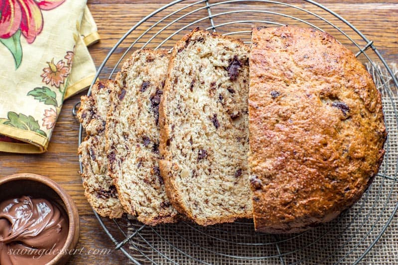 Chocolate Hazelnut Bread ~ a simple yeasted loaf of fluffy sweet bread, loaded with chunks of bittersweet chocolate and toasted hazelnuts. Serve with a slathering of Nutella for a wonderful treat! www.savingdessert.com #sweetbread #bread #chocolate #chocolatehazelnut #hazelnut #chocolatebread #savingroomfordessert