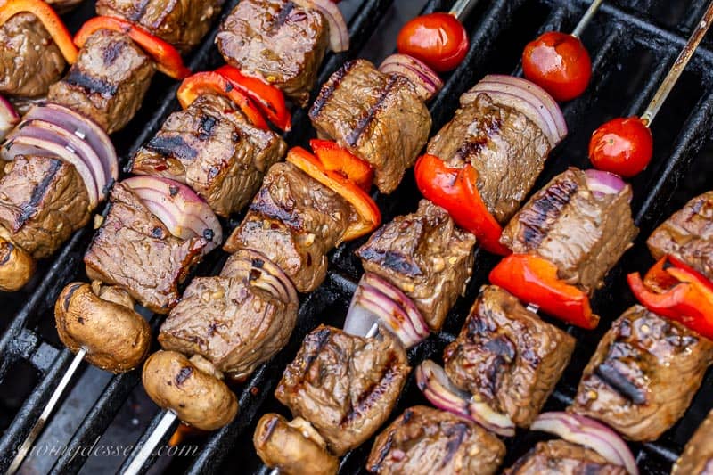 steak kabobs on a grill