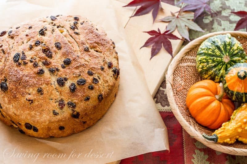 An overhead view of a golden brown loaf of Barmbrack