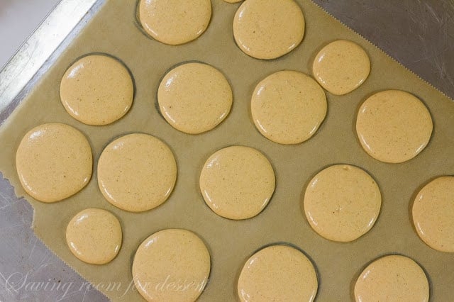 Pumpkin Macarons with Pumpkin Butter Buttercream | www.savingdessert.com