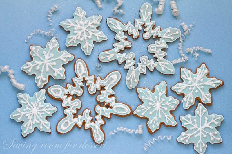 Gingerbread cookies cut into snowflake designs