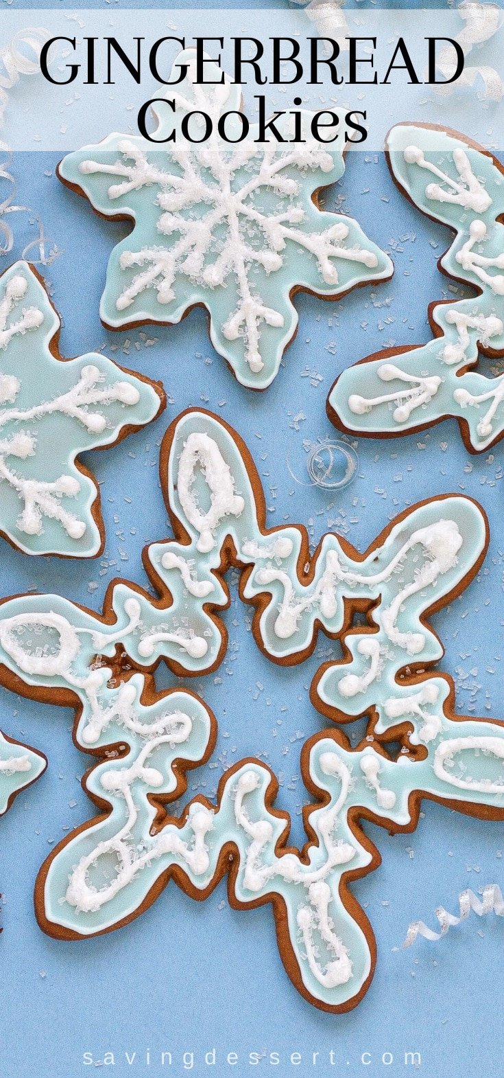 Gingerbread cookies cut into snowflake designs and decorated