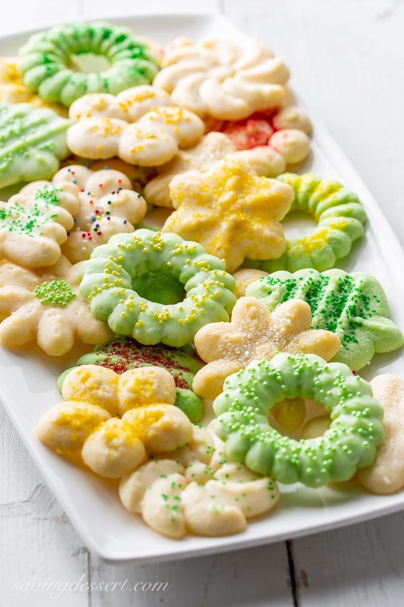 A platter of Spritz cookies in a variety of shapes and colors