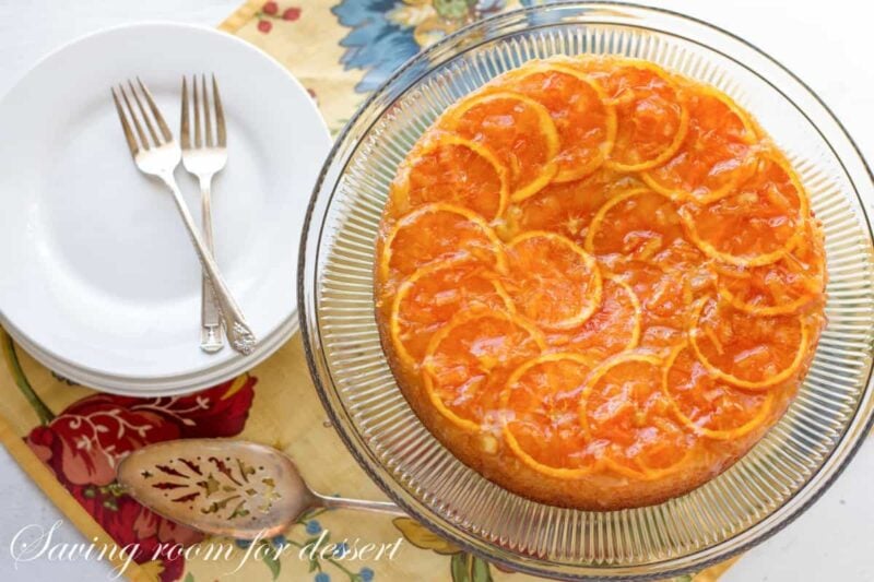 An orange marmalade cake on a cake stand