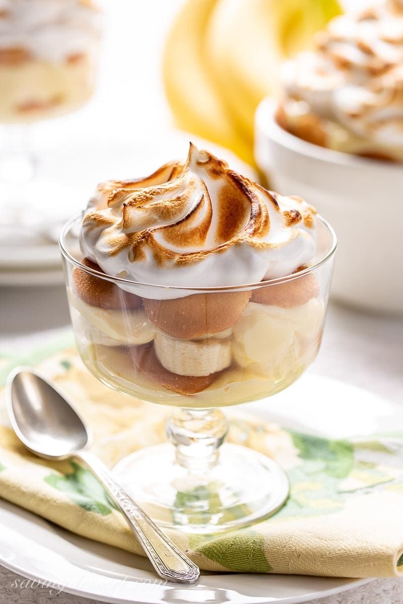 A single serving bowl of banana pudding topped with toasted meringue