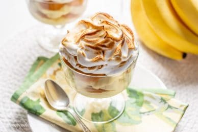 Banana pudding in a dish with bananas